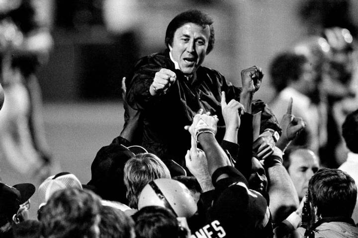 In this Jan. 23, 1984, file photo, coach Tom Flores gestures to members of the Los Angeles Raid ...