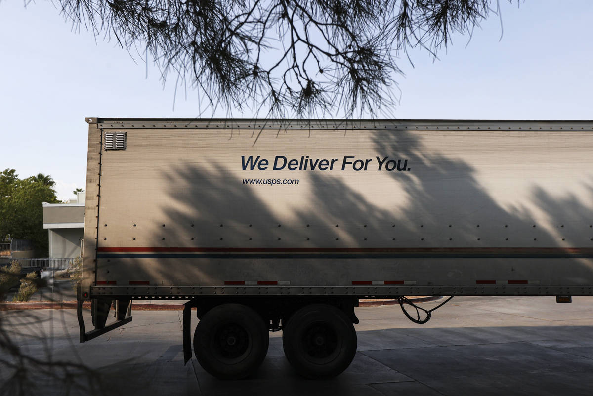 A truck arrives at the U.S. Postal Service center at 1001 E. Sunset Road in Las Vegas on Thursd ...