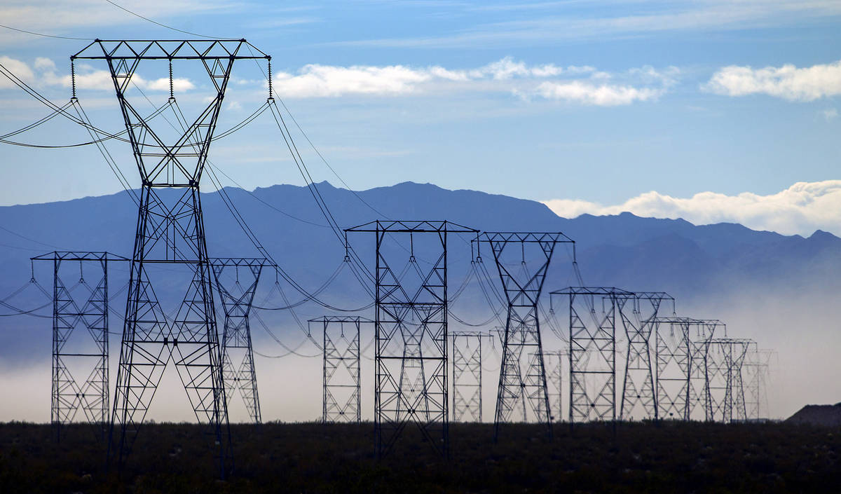 High winds whip up the dust near power lines west of I-95 South near Boulder City on Wednesday, ...