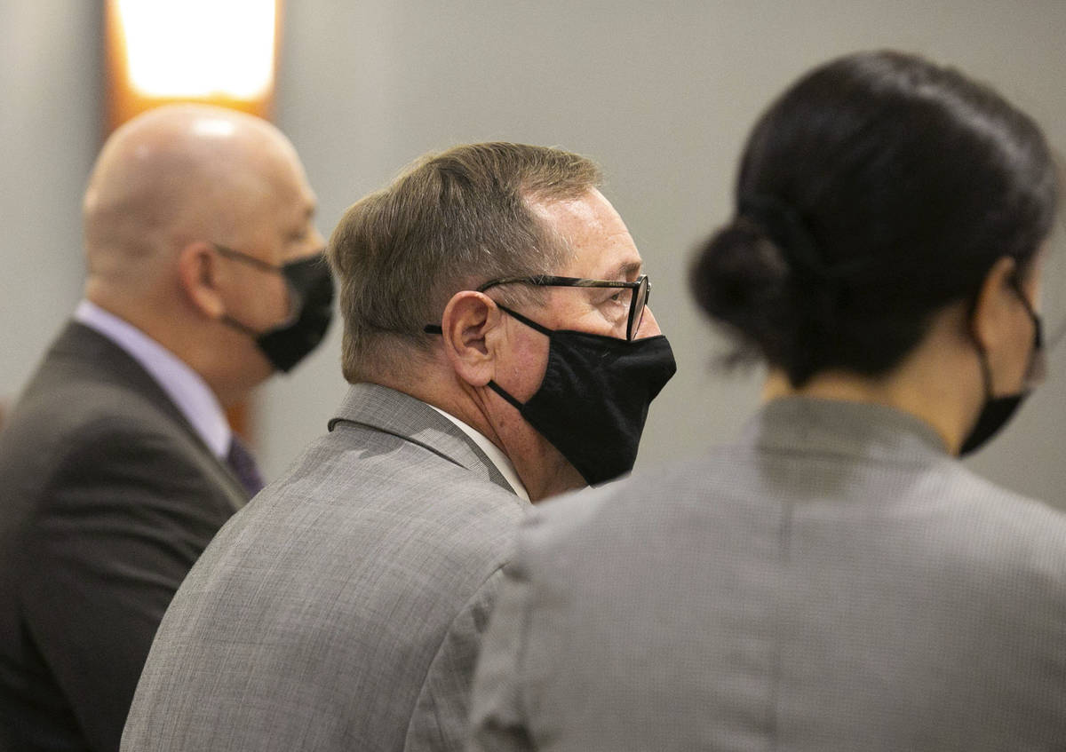 Former Las Vegas Convention and Visitors Authority CEO Rossi Ralenkotter, center, appears in co ...