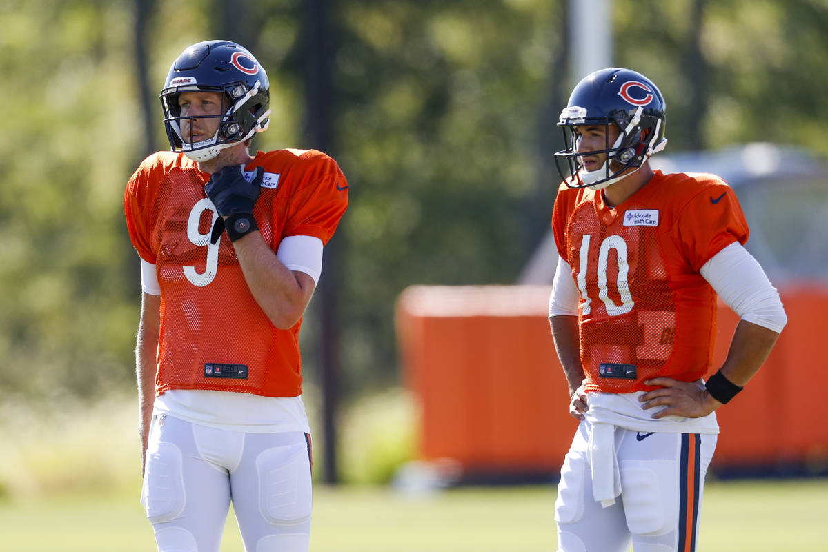 Chicago Bears quarterback Nick Foles (9) and Chicago Bears quarterback Mitch Trubisky (10) atte ...