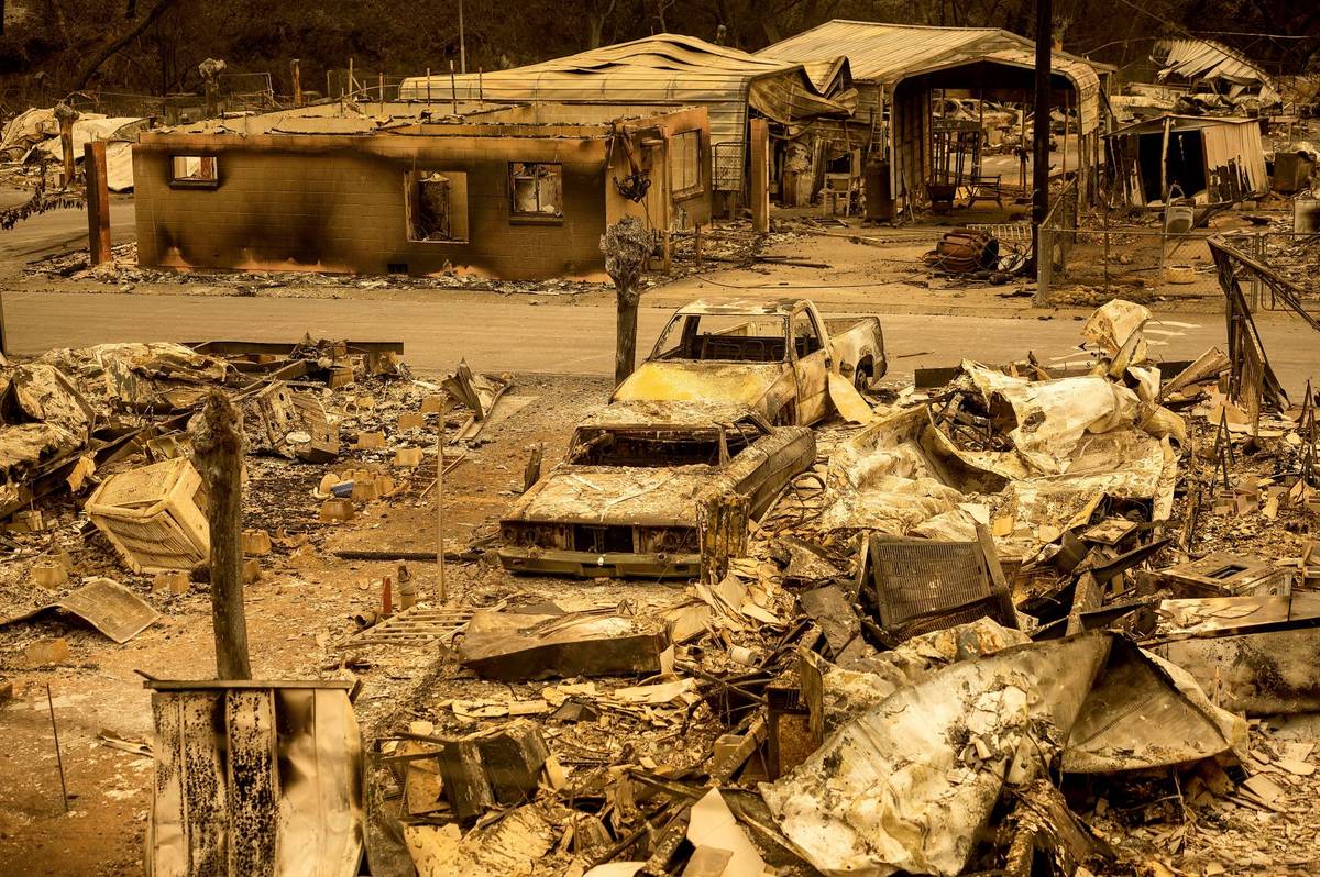 Scorched homes and vehicles fill Spanish Flat Mobile Villa following the LNU Lightning Complex ...