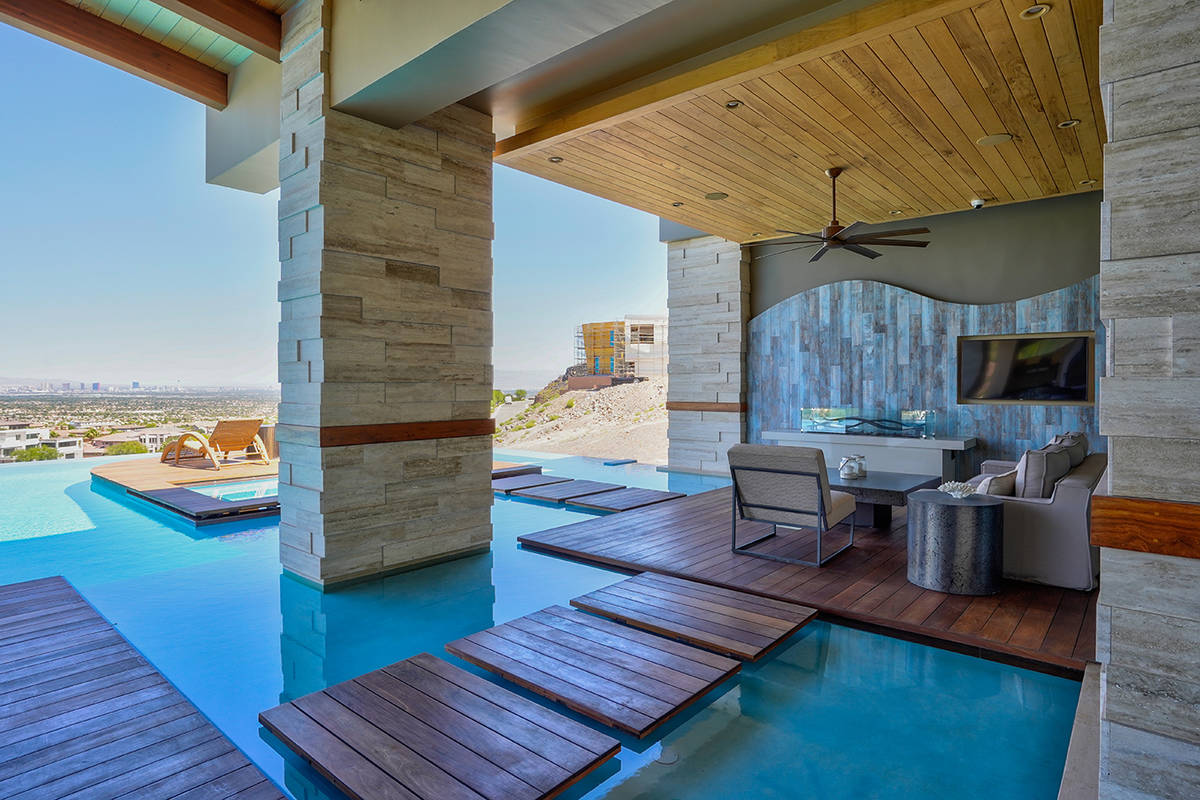 Water features are throughout the home and property. (Sun West Custom Homes)