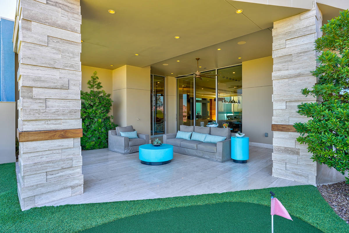 Water features surround the house, which was Sun West Custom Homes' showcase in MacDonald Highl ...