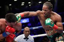 In this Sept. 8, 2018, file photo, Shawn Porter, right, punches Danny Garcia during the eighth ...