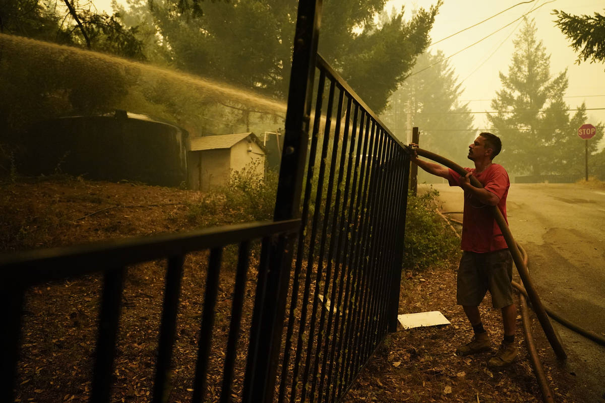 Brian Alvarez joins a group of civilian volunteers fighting the CZU August Lightning Complex Fi ...