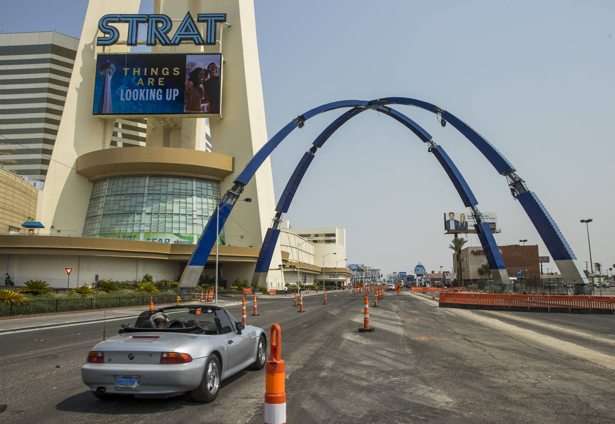 Construction continues of the 80-foot-tall gateway arch with all four columns now attached over ...