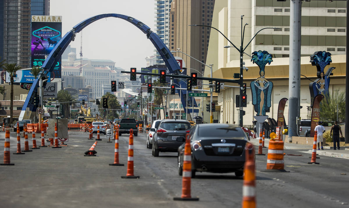 The street is in transition as construction continues of the 80-foot-tall gateway arch over Las ...