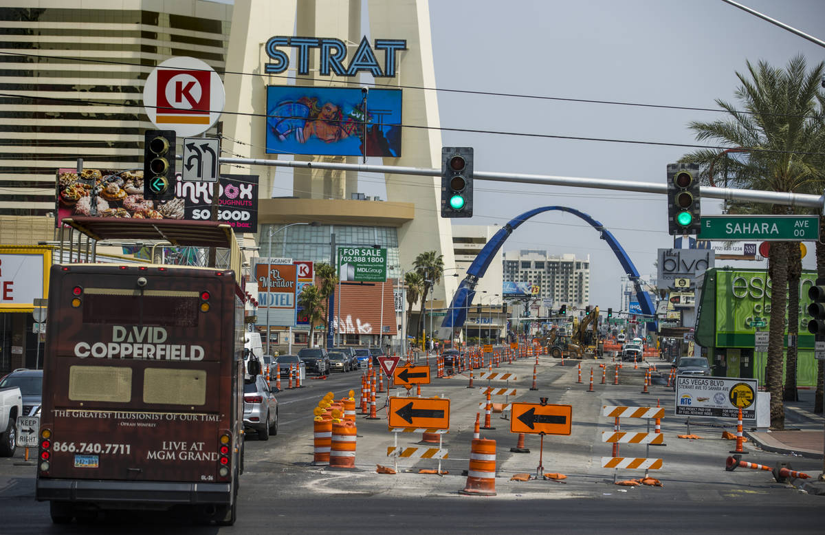 The street is in transition as construction continues of the 80-foot-tall gateway arch over Las ...