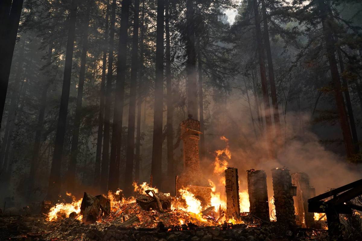 A home is burned to the ground by the CZU August Lightning Complex Fire, Thursday, Aug. 20, 202 ...
