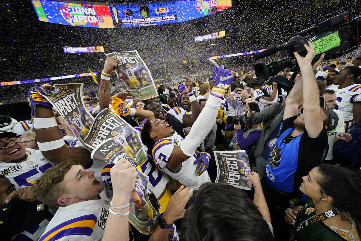 LSU celebrates after their win against Clemson in a NCAA College Football Playoff national cham ...