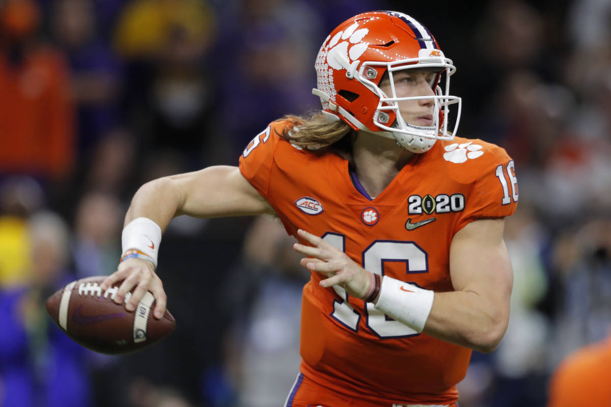 FILE - In this Jan. 13, 2020, file photo, Clemson quarterback Trevor Lawrence passes against LS ...