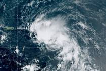 Tropical Storm Laura is seen in the North Atlantic Ocean, Friday, Aug. 21, 2020. (NOAA via AP)