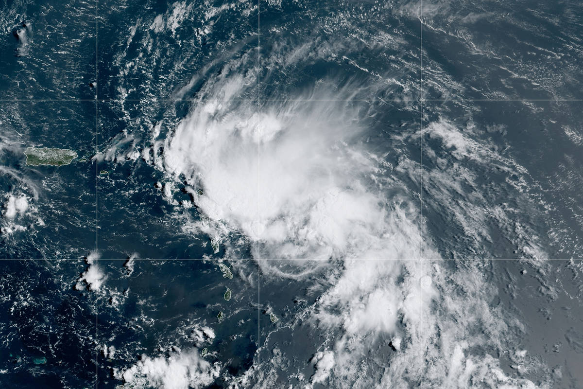 This satellite image released by the National Oceanic and Atmospheric Administration (NOAA) sho ...