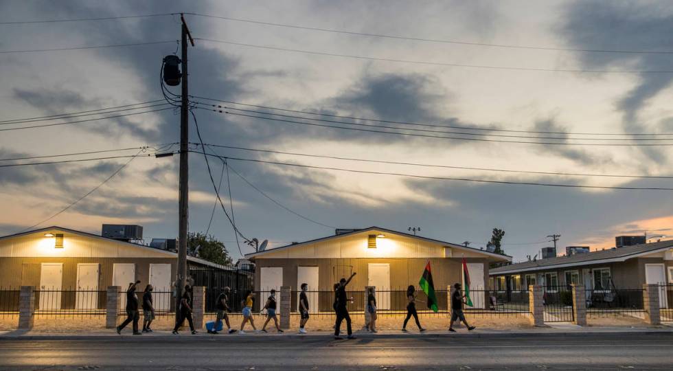 New Era Las Vegas members march along H Street on Tuesday, August, 18, 2020, in Las Vegas.