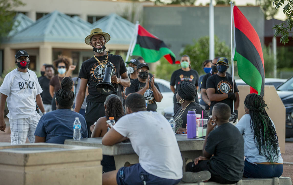 Minister Vance "Stretch" Sanders, founder and president of New Era Las Vegas, laughs ...