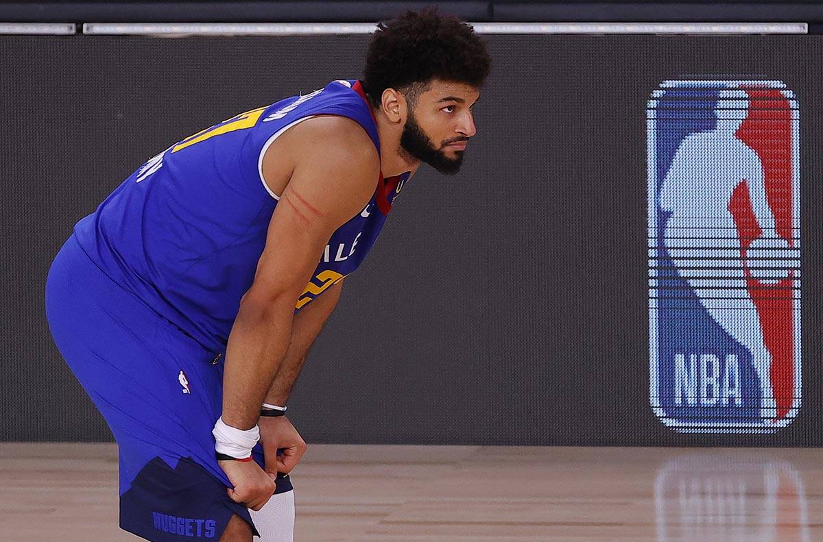 Denver Nuggets' Jamal Murray reacts during the fourth quarter against the Utah Jazz in Game 4 o ...