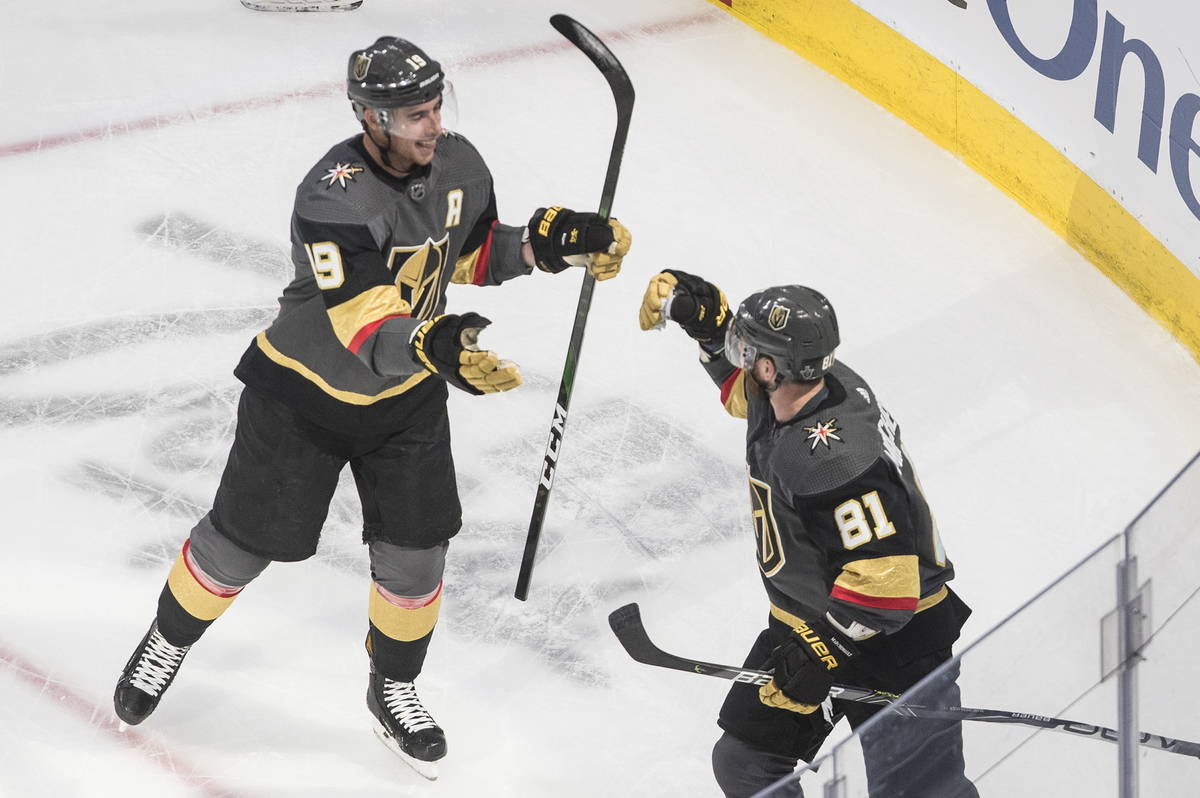 Vegas Golden Knights' Reilly Smith (19) and Jonathan Marchessault (81) celebrate a goal against ...