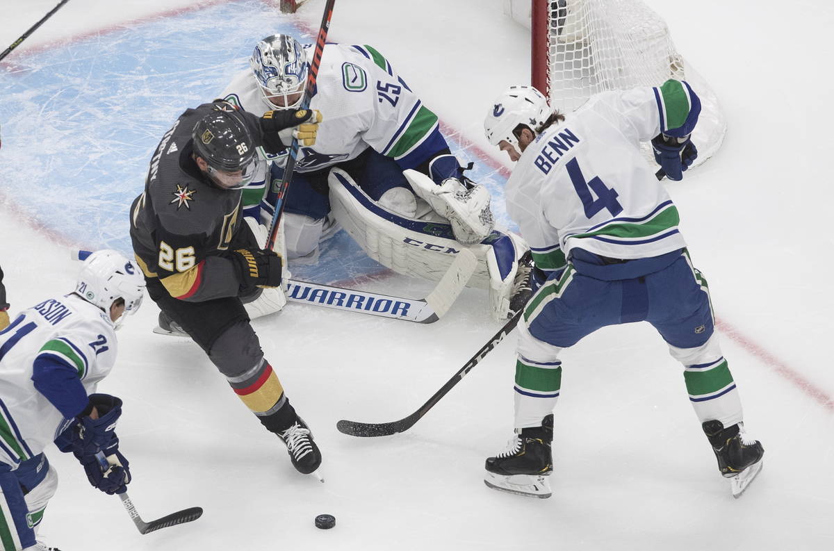 Vegas Golden Knights' Paul Stastny (26) is stopped by Vancouver Canucks goalie Jacob Markstrom ...