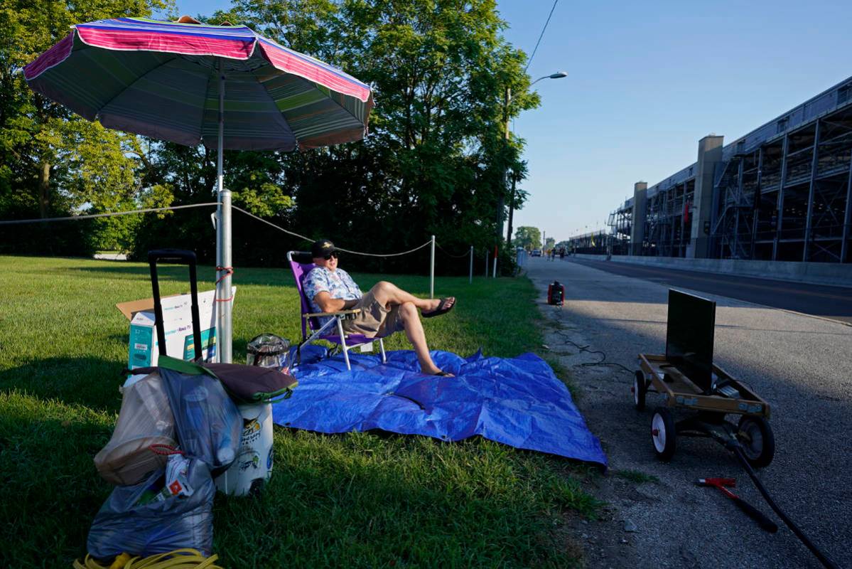 Andy Guthormsen sets up outside of the Indianapolis Motor Speedway, Sunday, Aug. 23, 2020, in I ...