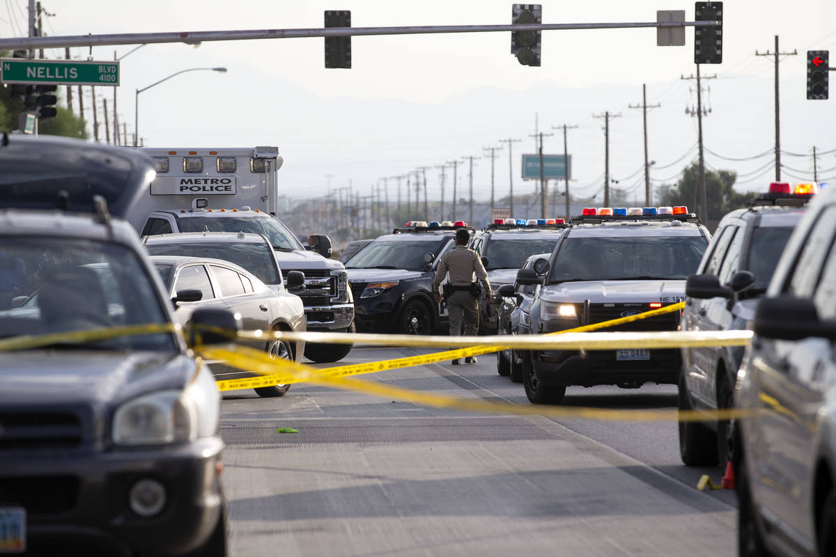 Metropolitan police investigate a homicide near the intersection of North Las Vegas Boulevard a ...