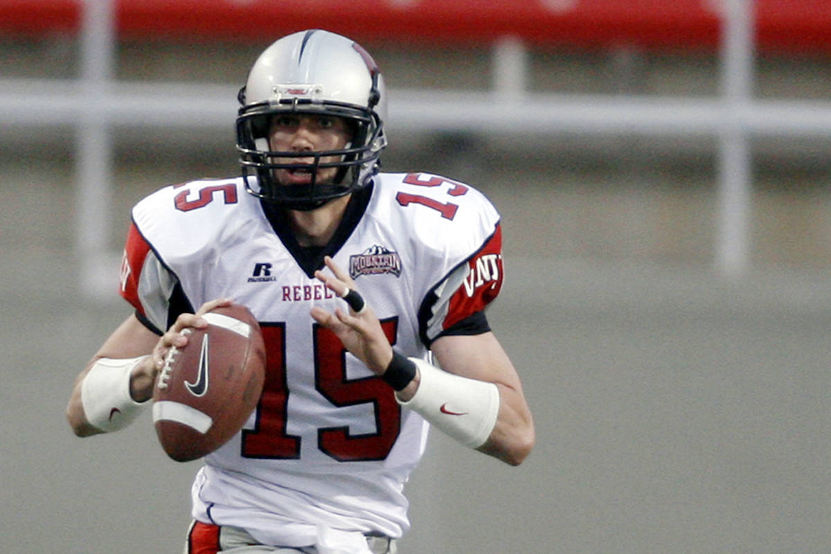 Quarterback Shane Steichen looks to pass during the Rebels spring scrimmage football game at Sa ...