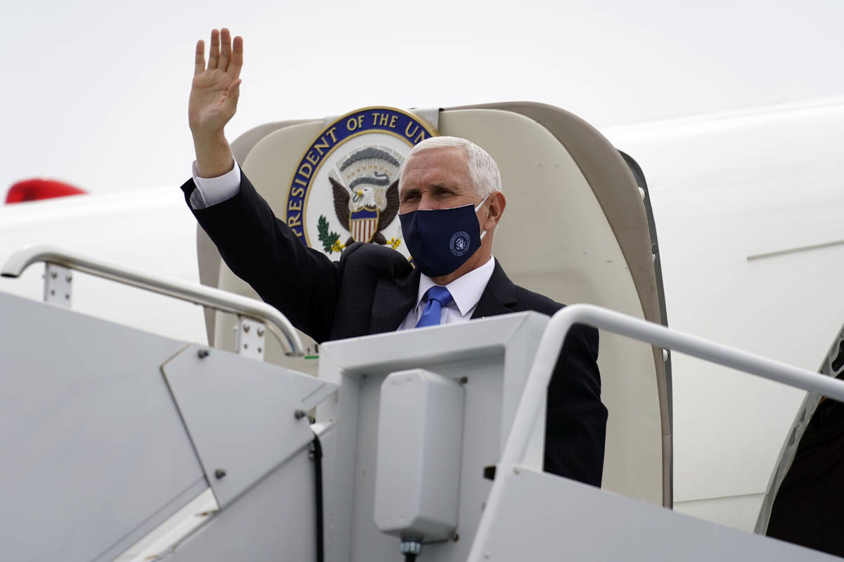 Vice President Mike Pence arrives at Charlotte Douglas International Airport in Charlotte, N.C. ...