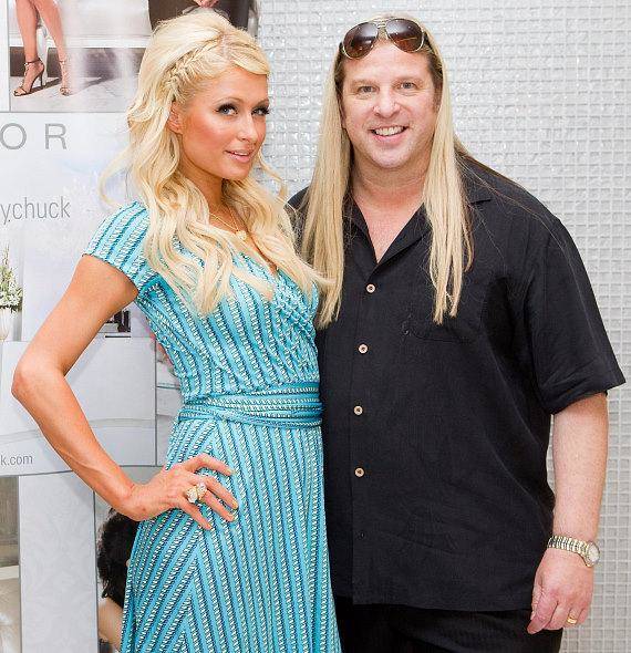 Celebrity stylist Michael Boychuck works on Paris Hilton's hair. He announced a partnership wit ...