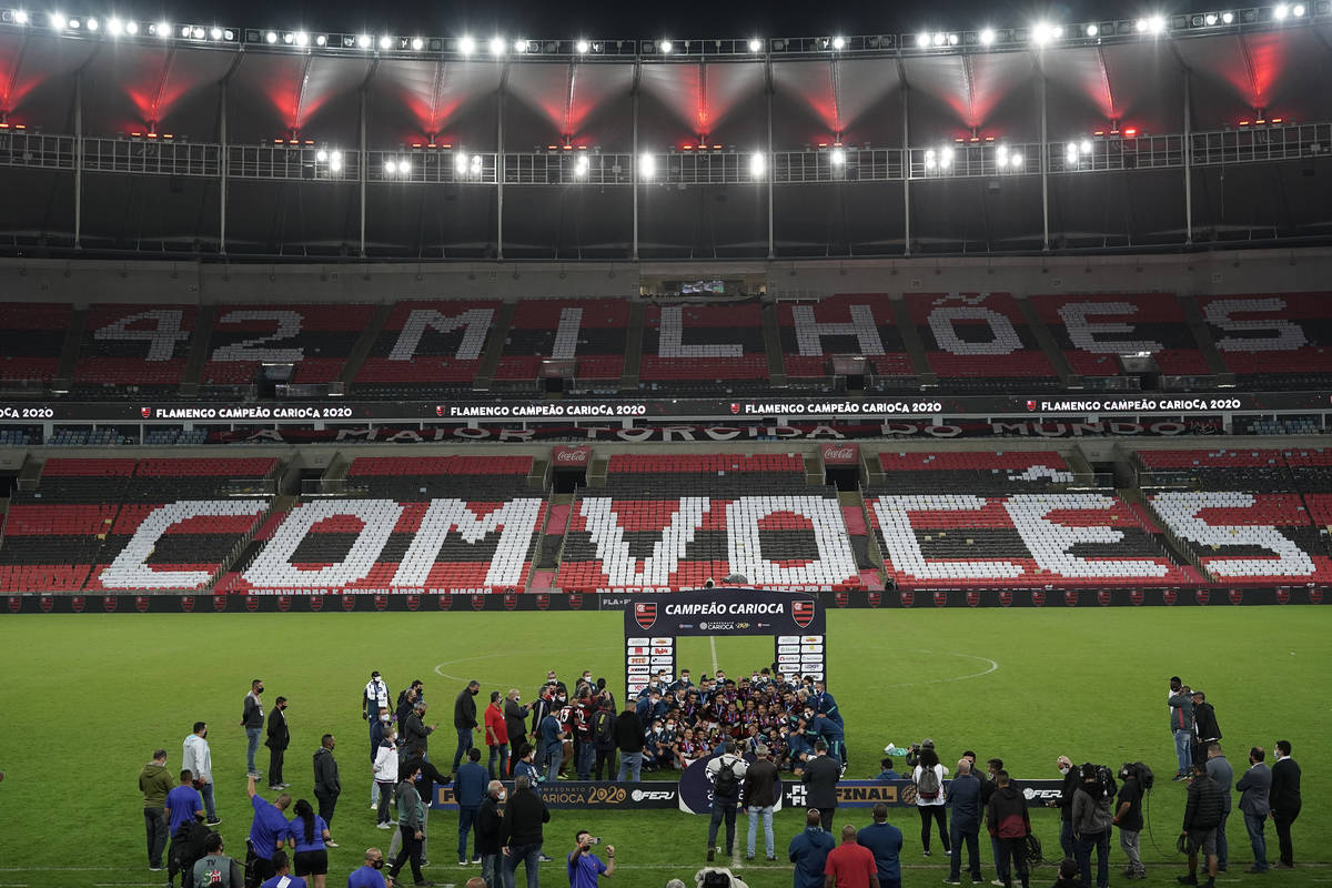 Soccer players of Flamengo celebrate with their trophy after winning the Rio de Janeiro state c ...