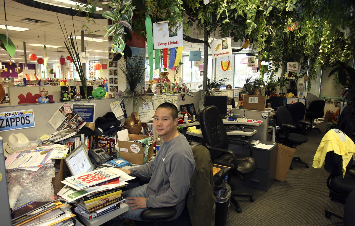 Zappos CEO Tony Hsieh works at his desk in an area called The Jungle, Friday Jan. 23, 2009. ( ...