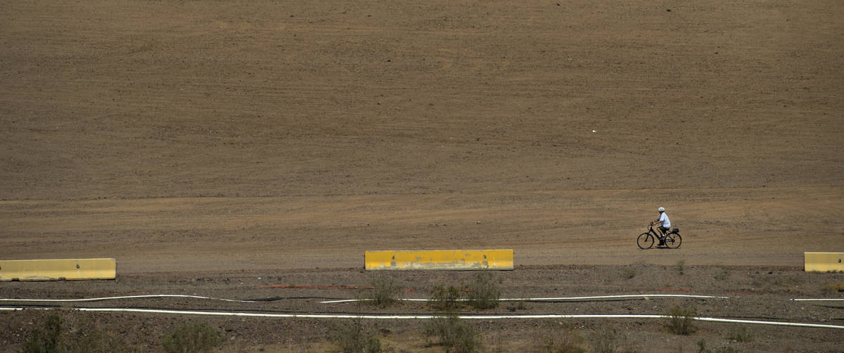 A cyclist rides up from the Lake Mead Marina about the Lake Mead National Recreation Area Tuesd ...
