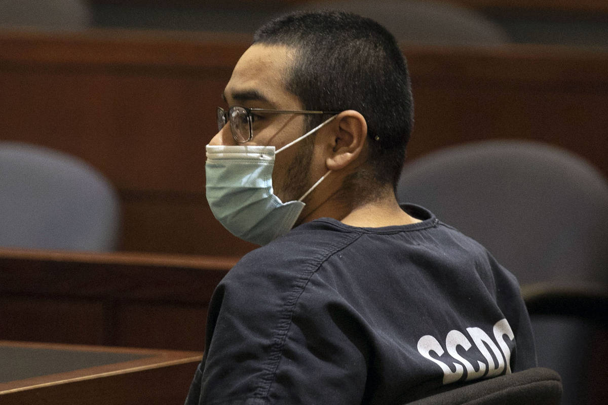 Edgar Samaniego, charged in the shooting of a Las Vegas police officer, appears in court during ...