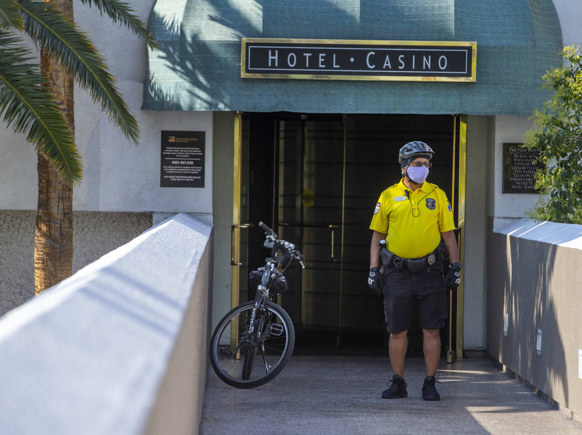 A security guard works the hotel and casino entrance leading from the garage as the Mirage reop ...