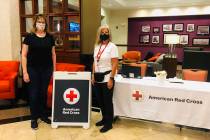 Heather McMurran and Emma Empey (right) wait for their orders in Baton Rouge to assist with Hur ...