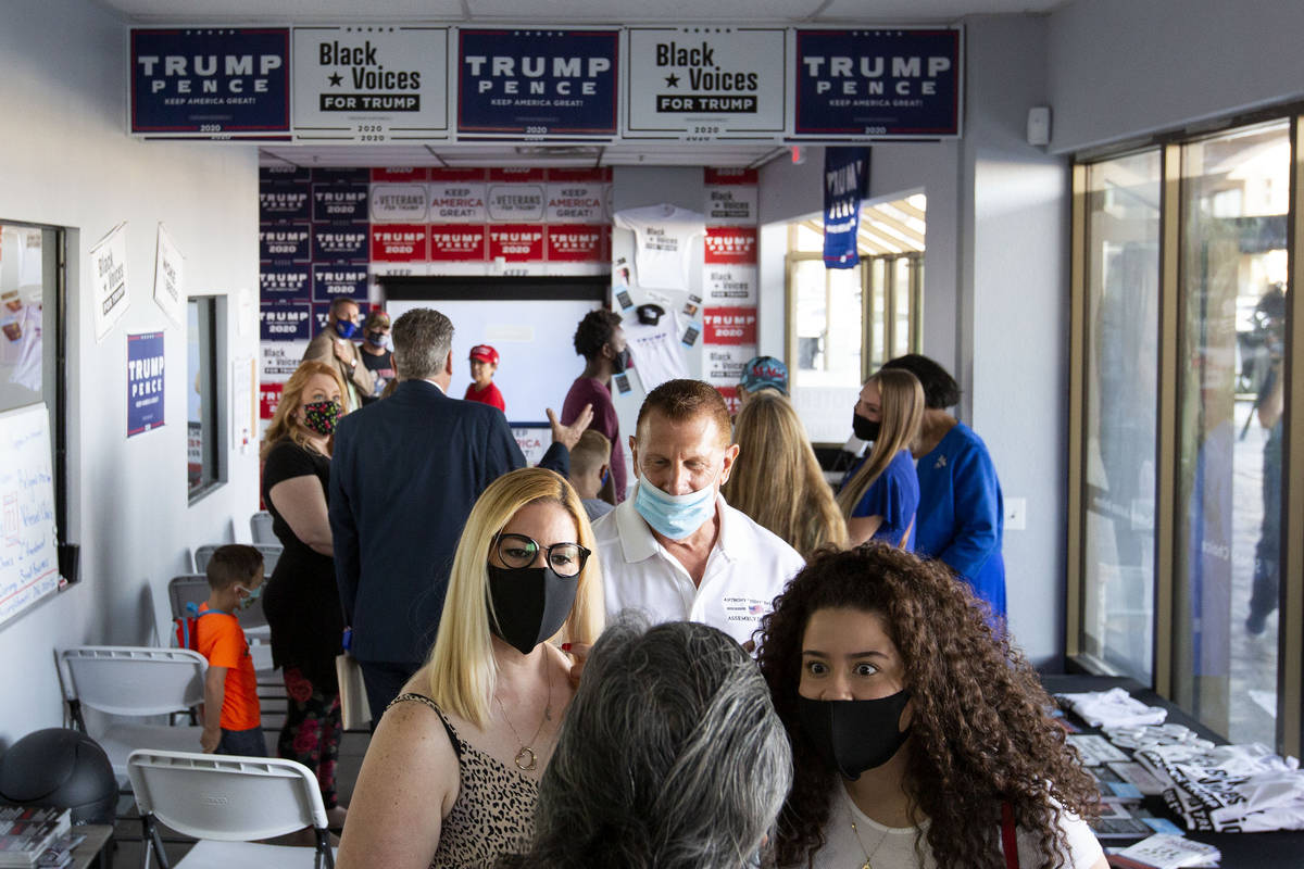 Trump supporters mingle before a watch party for the Republican National Convention on Tuesday, ...