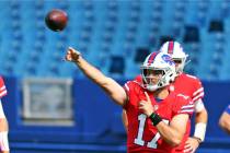 Buffalo Bills quarterback Josh Allen throws a pass during pregame warmups in the ninth day of N ...