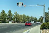 Vehicles travel through a school zone near Bob Miller Middle School in Henderson on Aug. 26, 20 ...