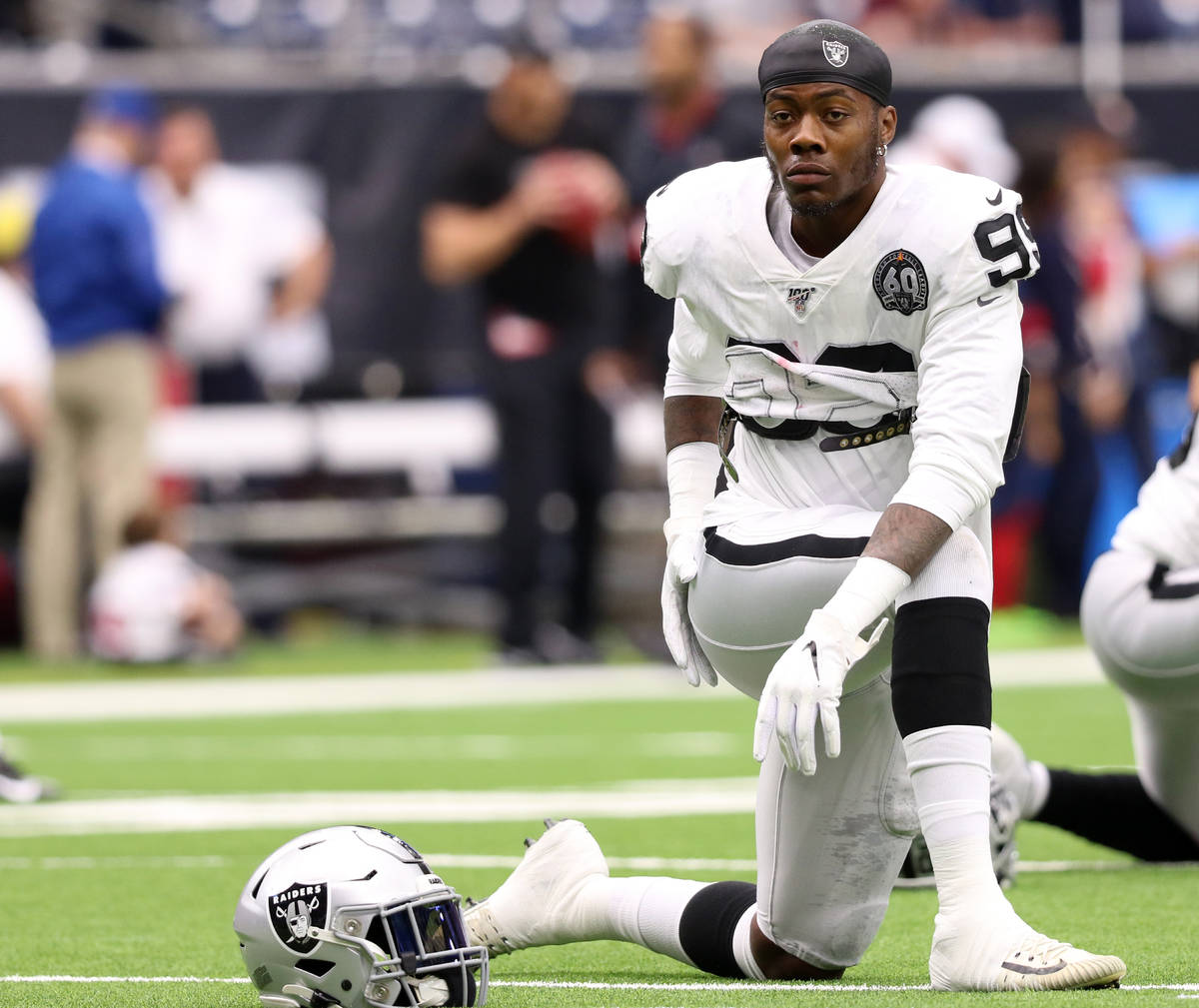 Oakland Raiders defensive end Arden Key (99) stretches before an NFL game against the Houston T ...