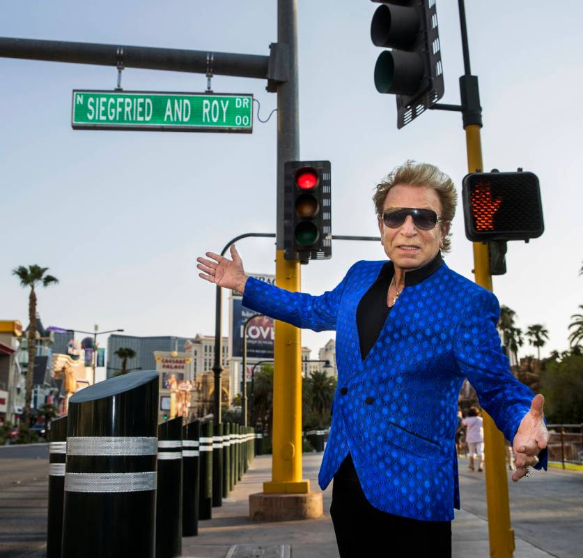 Siegfried Fischbacher is on hand along the Strip as the Mirage porte cochere is renamed Siegfri ...