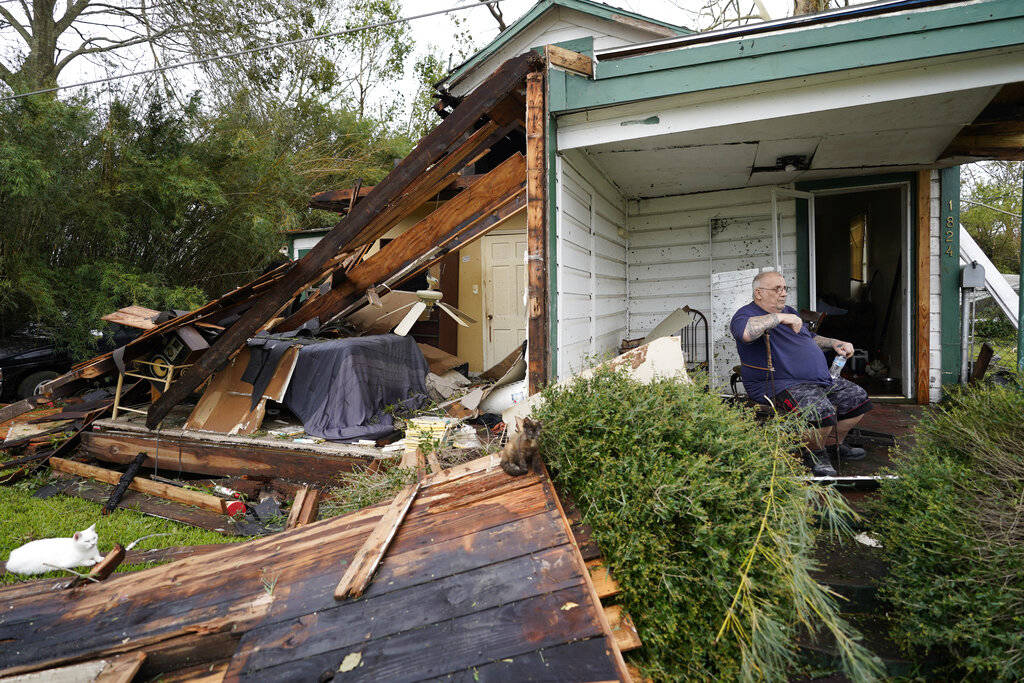 Chris Johnson views destruction at his home on Thursday, Aug. 27, 2020, in Lake Charles, La., a ...