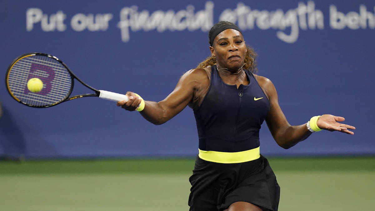 Serena Williams hits a shot to Maria Sakkari, of Germany, during the third round at the Western ...