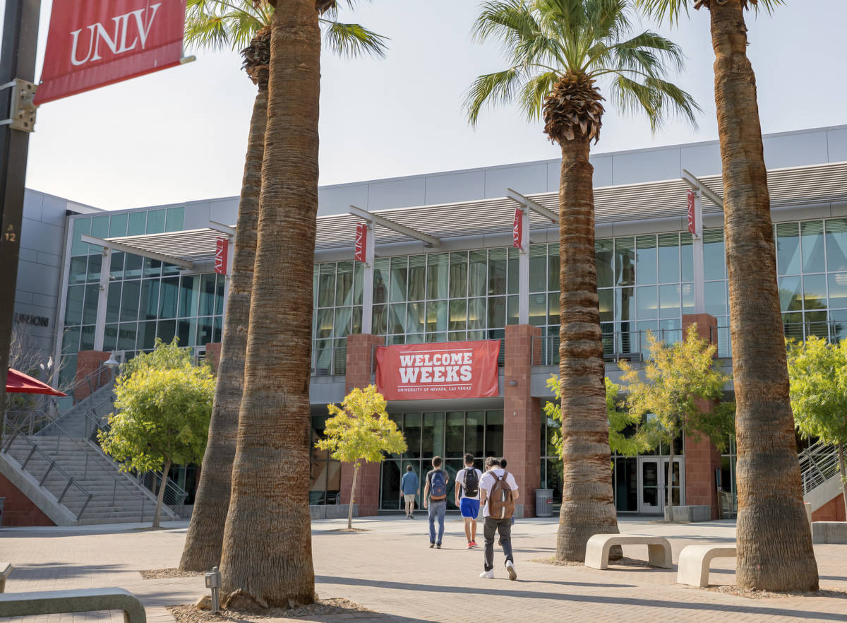 Students are seen outside of the Student Union at UNLV in Las Vegas on Thursday morning, Aug. 2 ...