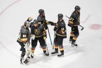 Vegas Golden Knights celebrate a win over the Vancouver Canucks in Game 1 of an NHL hockey seco ...