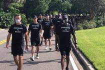 NBA referees march in support of players seeking an end to racial injustice in Lake Buena Vista ...