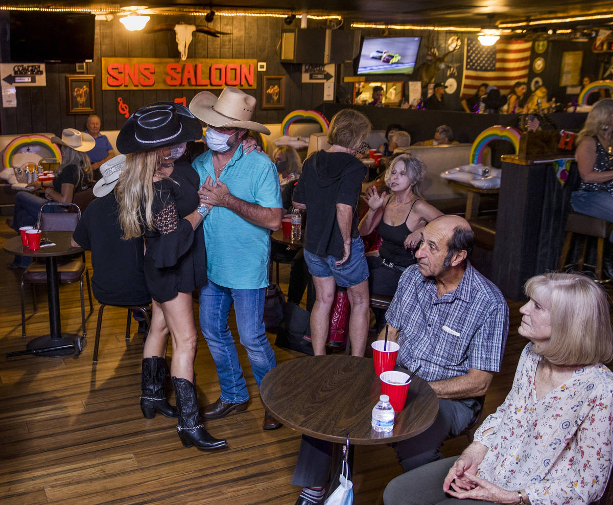 Patrons drink and take to the floor as owner Bobby Kingston plays with his band on the final ni ...