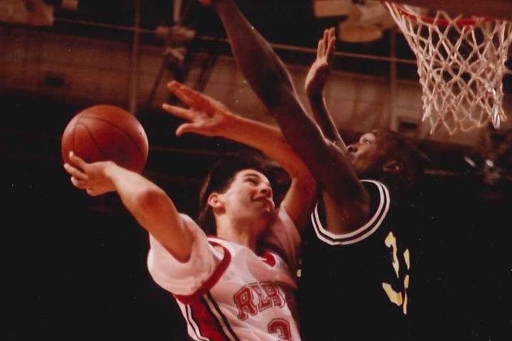UNLV's H Waldman goes up for a basket against Long Beach State on Jan. 9, 1992, at the Thomas & ...