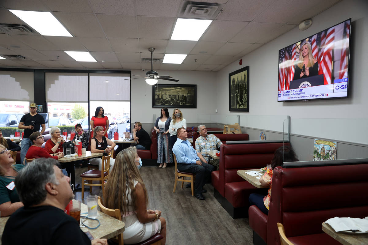 People attend a Republican National Convention watch party at the Omelet House in Las Vegas, Th ...