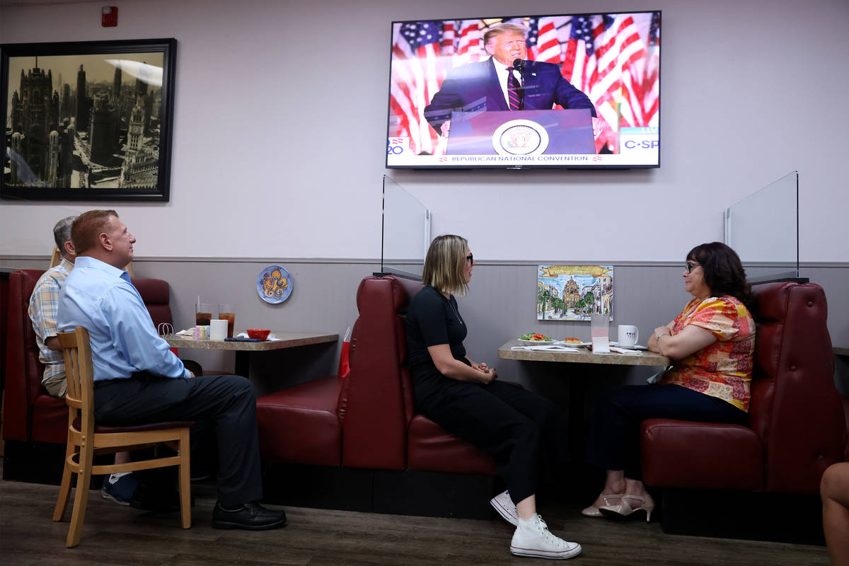 People attend a Republican National Convention watch party at the Omelet House in Las Vegas, Th ...
