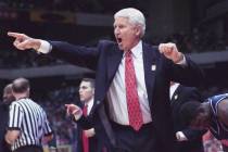 Arizona coach Lute Olson directs his team from the sidelines during the first half of the NCAA ...