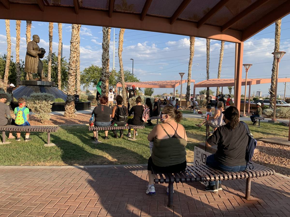 A rally and vigil in honor of victims of police brutality was being held in North Las Vegas on ...